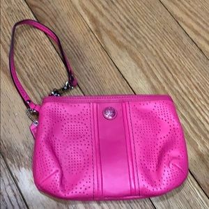 Coach wristlet punched leather logo in hot pink